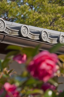 Roses and japanese temple roof clipart