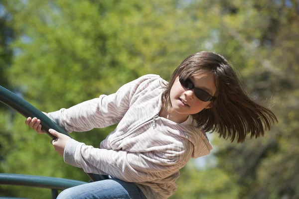 Girl leans out on ride. — Stock Photo, Image