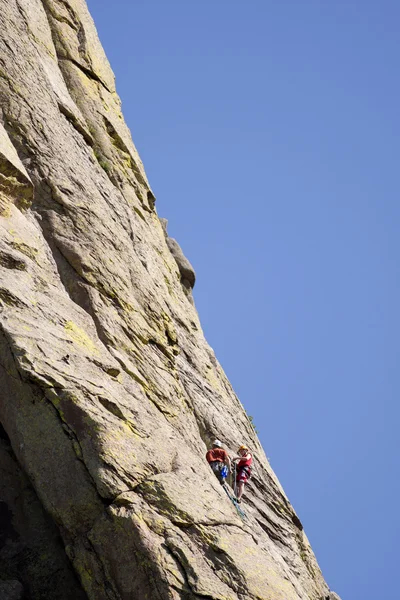 stock image Climbing high under blue sky.