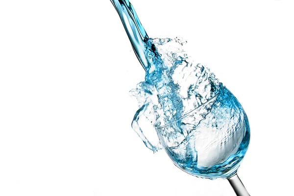 Blue drink splashed into glass. — Stock Photo, Image