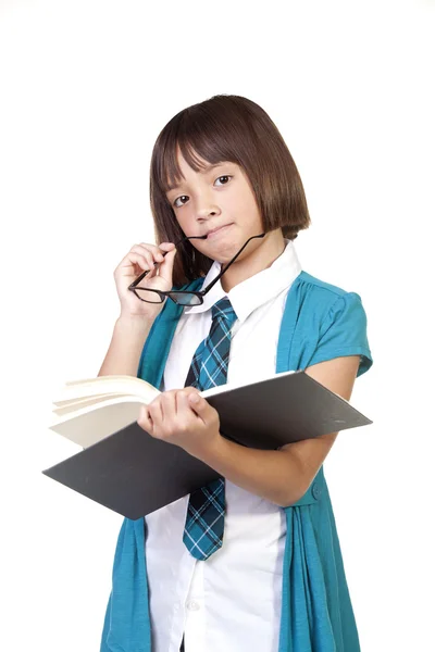 Girl contemplates about a book. — Stock Photo, Image