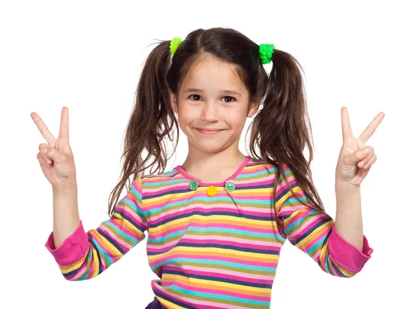 Kleines Mädchen mit Siegeszeichen — Stockfoto