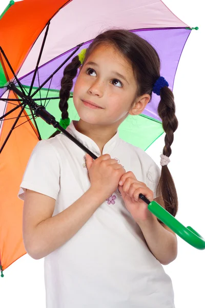 Little girl with umbrella, looking up — Stock Photo, Image