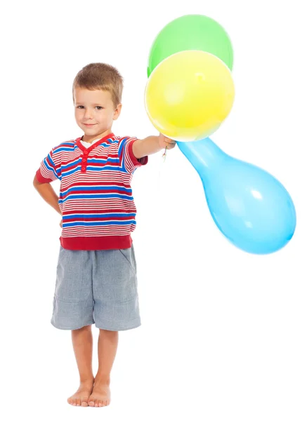 Menino sorridente com balões coloridos — Fotografia de Stock