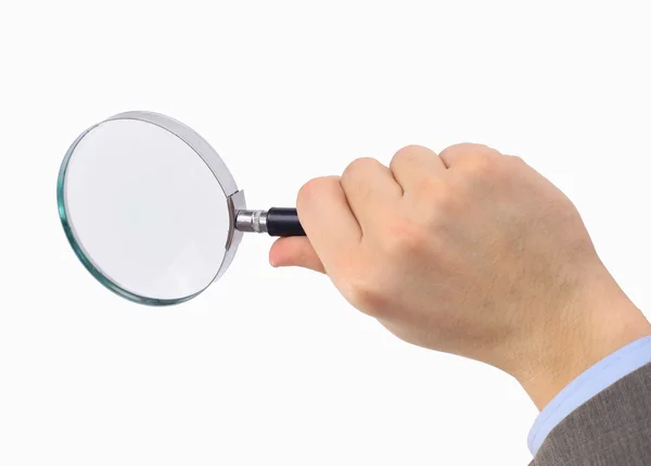 Magnifying glass in hand isolated on white background — Stock Photo, Image