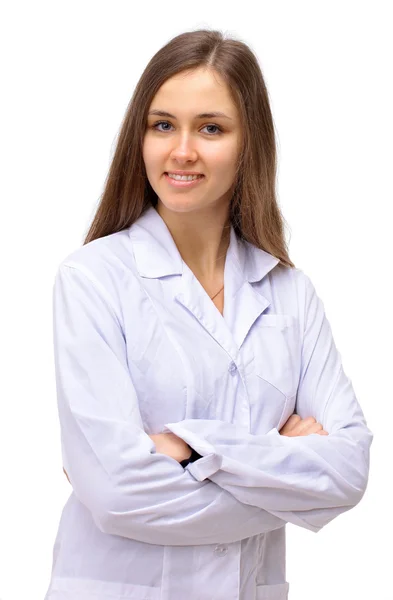 Портрет щасливої молодої жінки-лікаря, що стоїть на руках схрещеної ізольованої на — стокове фото