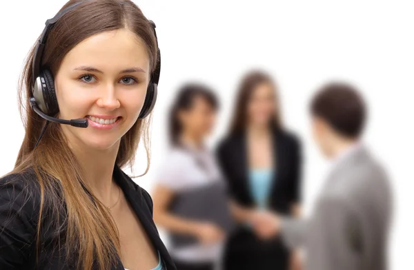 Lachende mooie zakenvrouw met headset. — Stockfoto