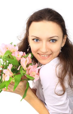 Beautiful woman with pink flowers lily isolated over white