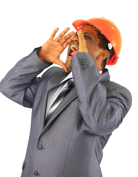 Een mannelijke bouwvakker een bouwterrein. — Stockfoto