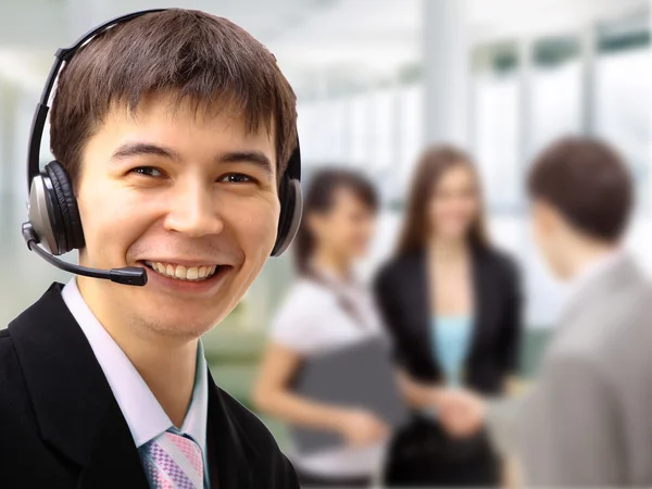 Friendly customer service consultants working — Stock Photo, Image