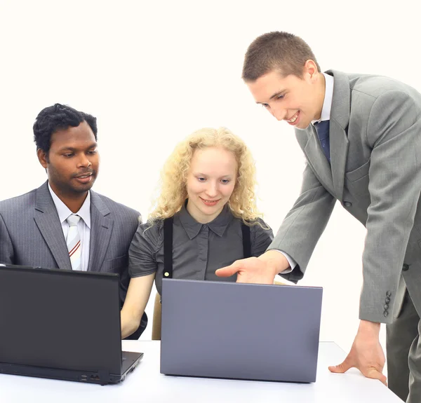 Interracial business team working at laptop — Stock Photo, Image