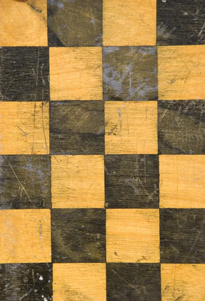 Гранж старинных шахматных досок фон — стоковое фото