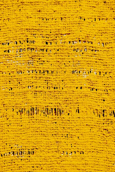 Grov gul målade tyg bakgrund — Stockfoto