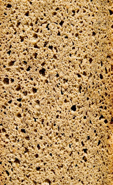 Экологический ломтик коричневого хлеба — стоковое фото