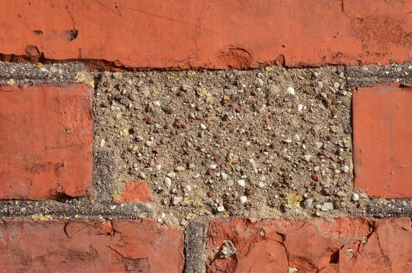 Vermelho tijolos parede fragmento fundo — Fotografia de Stock