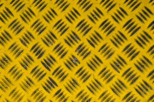 Amarelo e preto pintado fundo de metal — Fotografia de Stock
