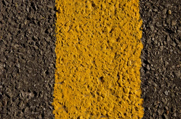 Fondo asfaltado gris, negro y amarillo — Foto de Stock