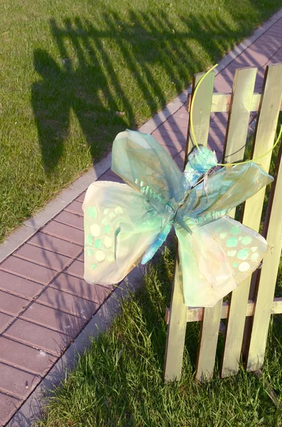 Paper butterfly in the park — Stock Photo, Image