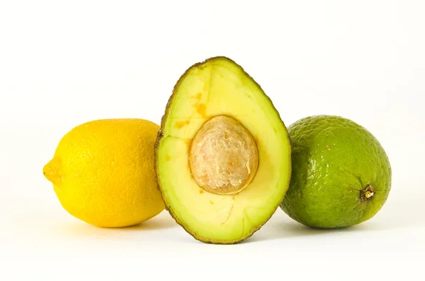 Two lemons and avocado — Stock Photo, Image