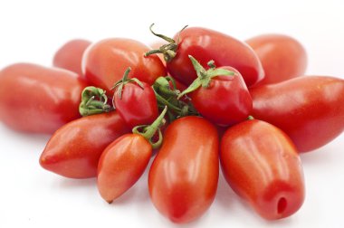 Organic Tomatoes on the White Background