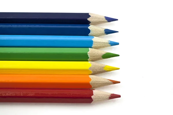 Zeven potloden van regenboog kleuren — Stockfoto
