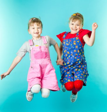 Twin sisters jumping clipart