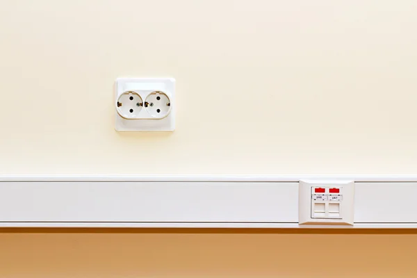 Rj45 socket and the socket 220 on the wall — Stock Photo, Image