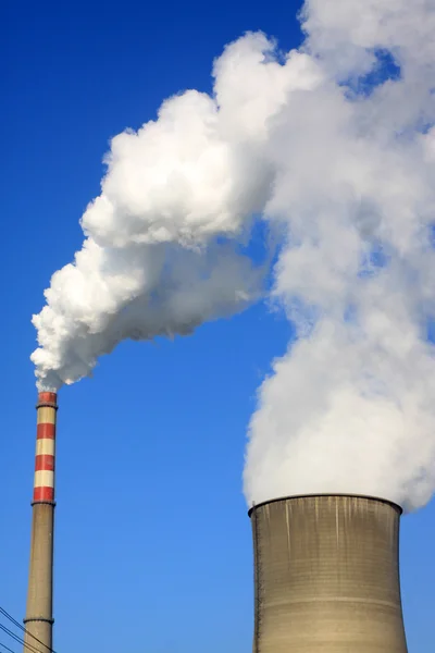 Stock image White smoke billowed from the chimney