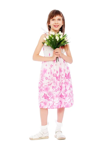 Fröhliches kleines Mädchen mit Tulpenstrauß — Stockfoto