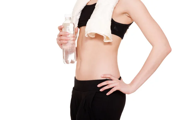 Sportswoman with towel and bottle — Stock Photo, Image
