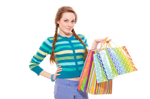 Gelukkig mooie vrouw met shopping tassen — Stockfoto
