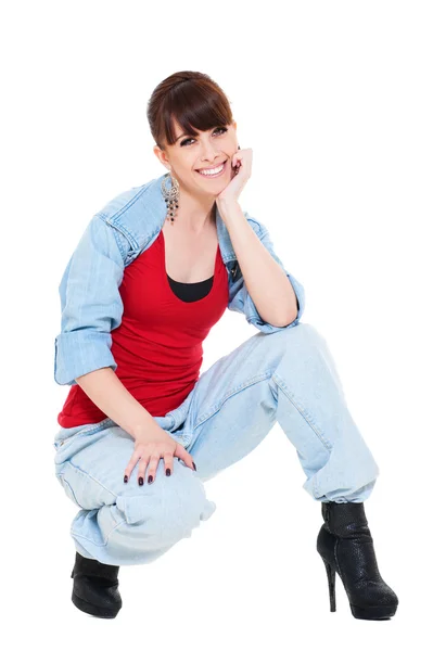 Donna sorridente in jeans — Foto Stock