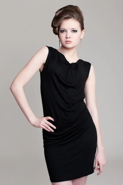 Sexy slim woman in black dress — Stock Photo, Image