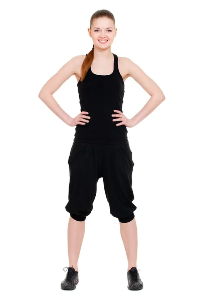 Mujer en ropa deportiva negra aislada en blanco — Foto de Stock