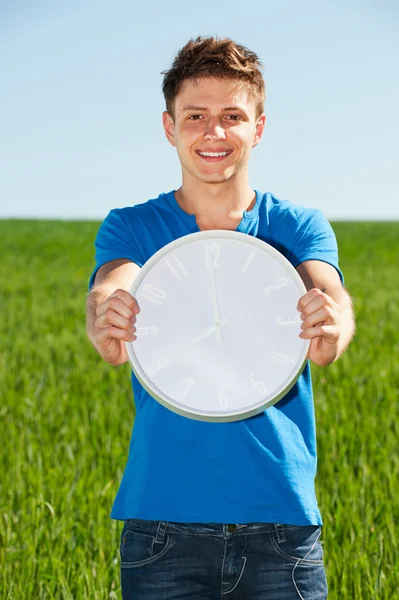 Man holding clock — Stock Photo, Image