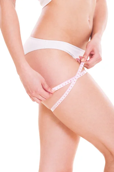 Slim woman measuring her hip — Stock Photo, Image