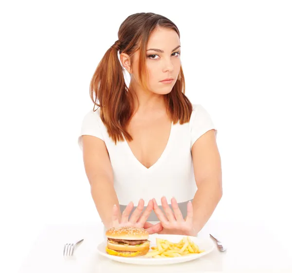 Жінка не хоче їсти нездорову їжу — стокове фото