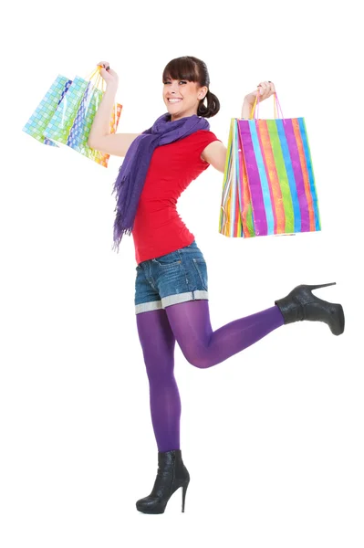 Alışveriş torbaları ile neşeli kadın — Stok fotoğraf