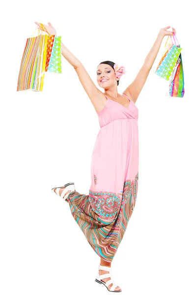 Fröhliche junge Frau mit Einkaufstüten — Stockfoto