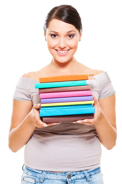Modelo Smiley segurando livros de muitas cores — Fotografia de Stock