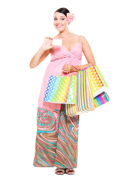 Nő hitelkártyával és bevásárlótáskákkal — Stock Fotó