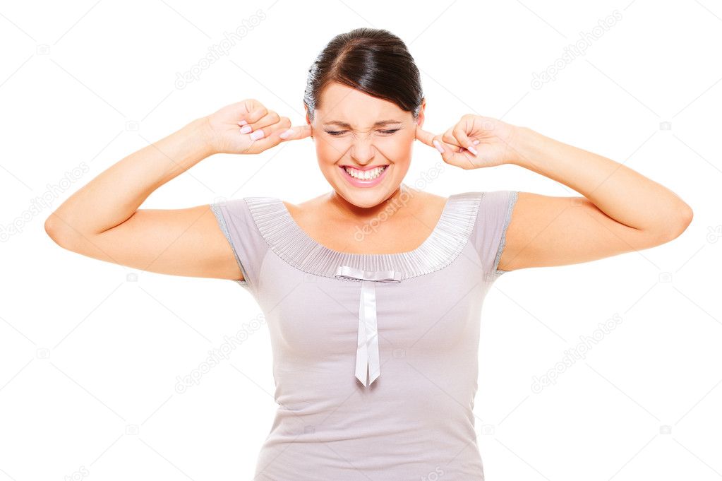 Stressful woman with fingers in ears