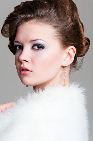 Attractive woman in white fur — Stock Photo, Image