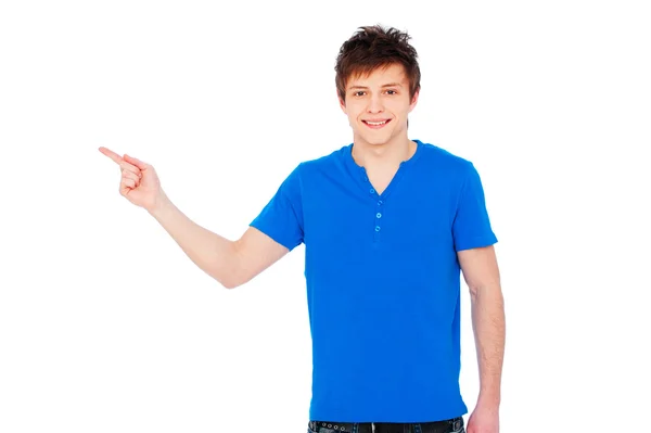 Man in blauw t-shirt die omhoog wijst — Stockfoto