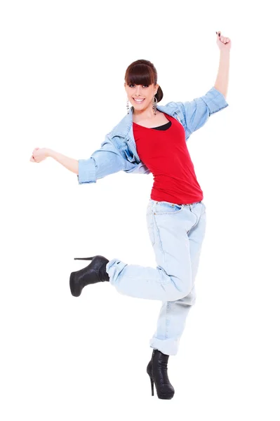 跳舞的女孩穿着蓝色牛仔裤 — 图库照片