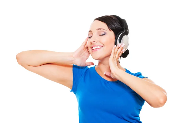 Mulher feliz em fones de ouvido — Fotografia de Stock