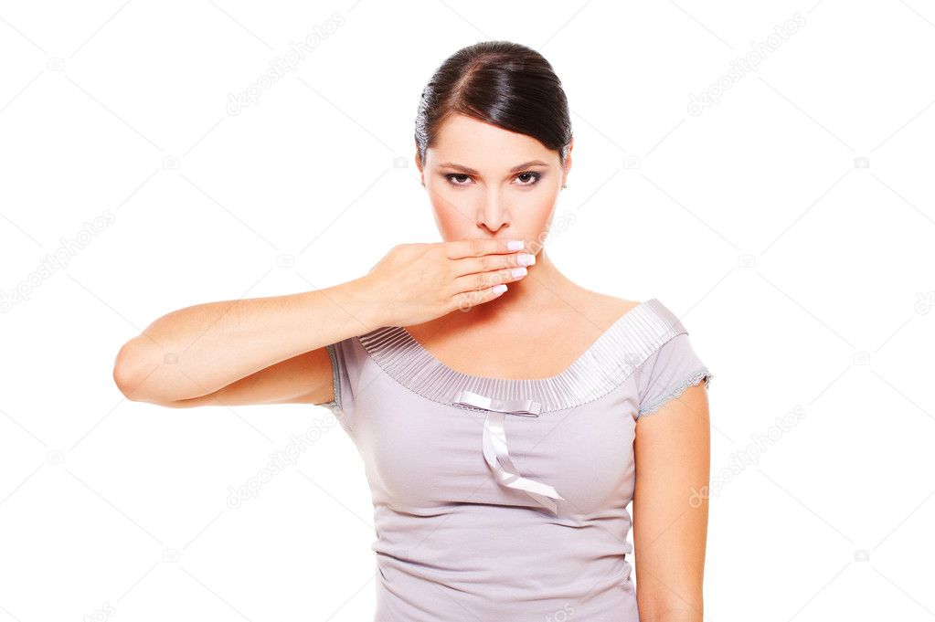 Serious woman covering her mouth