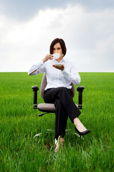 Businesswoman with white cup of coffee — Stock Photo, Image