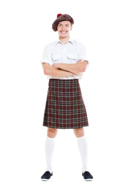 Happy guy in national scotch clothes clipart