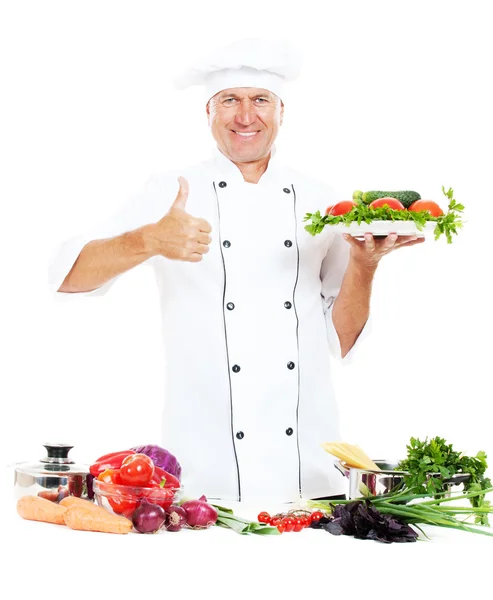 Cozinheiro alegre mostrando polegares para cima — Fotografia de Stock